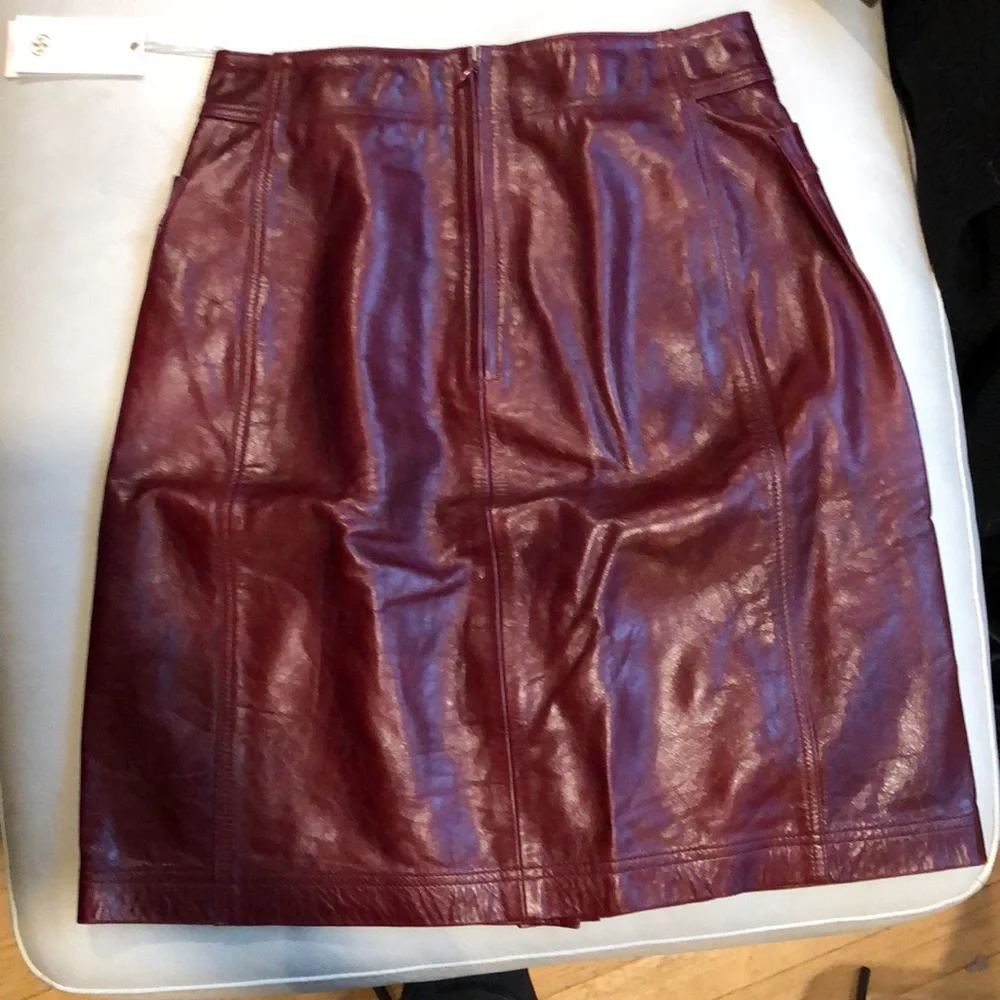 Tory Burch burgundy leather skirt with gold clasps on front - Picture 7 of 8